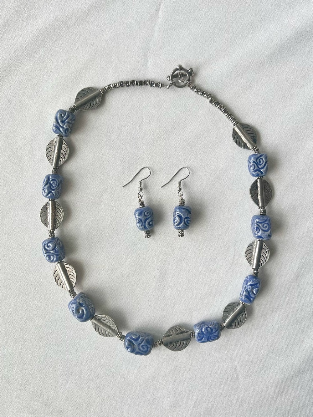 Handmade Blue Ceramic Bead Necklace with Silver Leaf Accents and Earrings